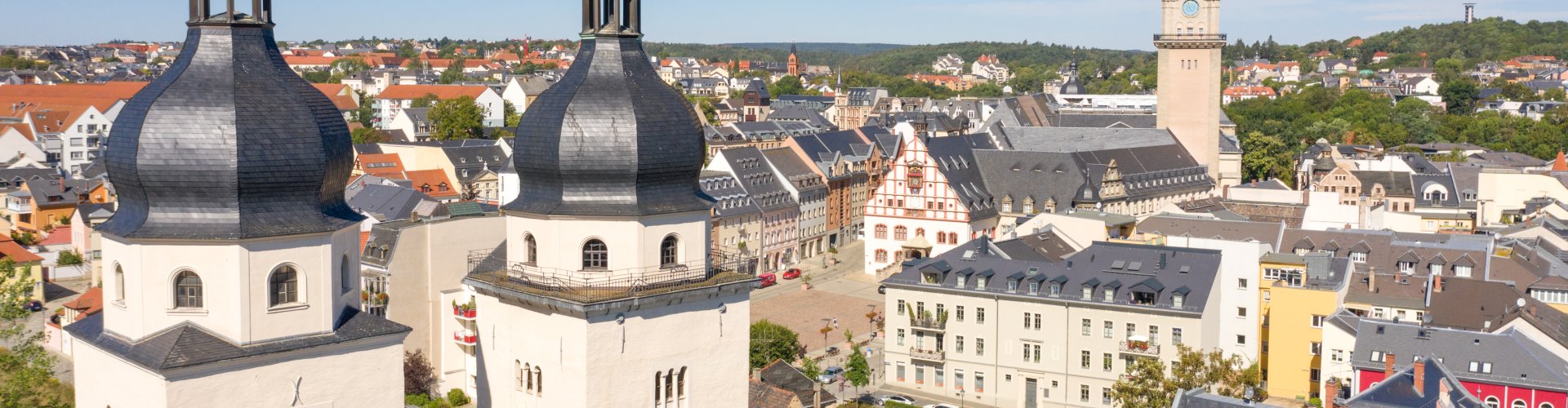 Plauen night skyline with parked cars