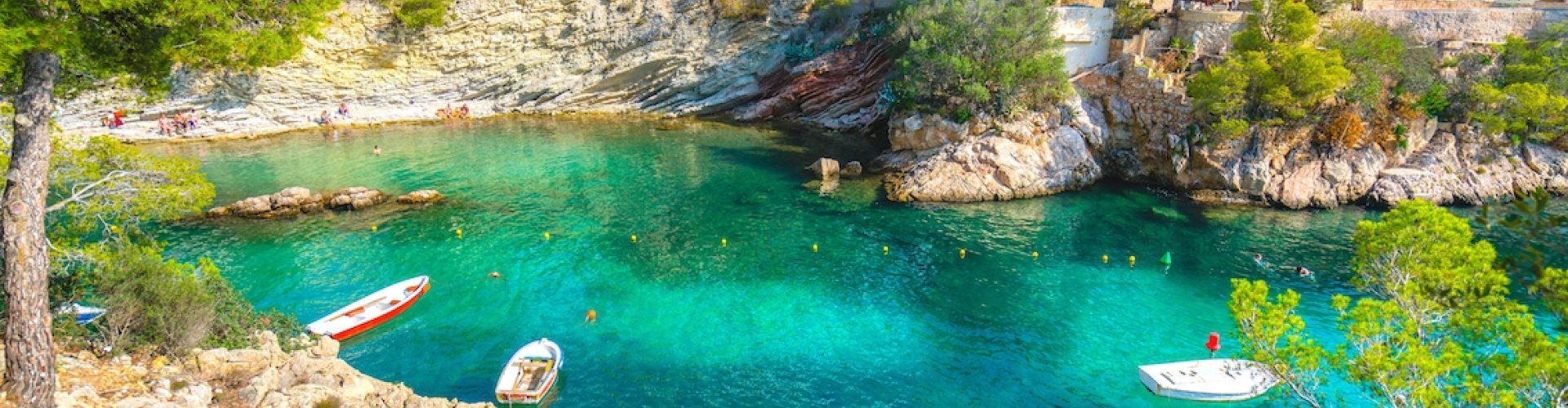 Santa Ponsa night skyline with parked cars