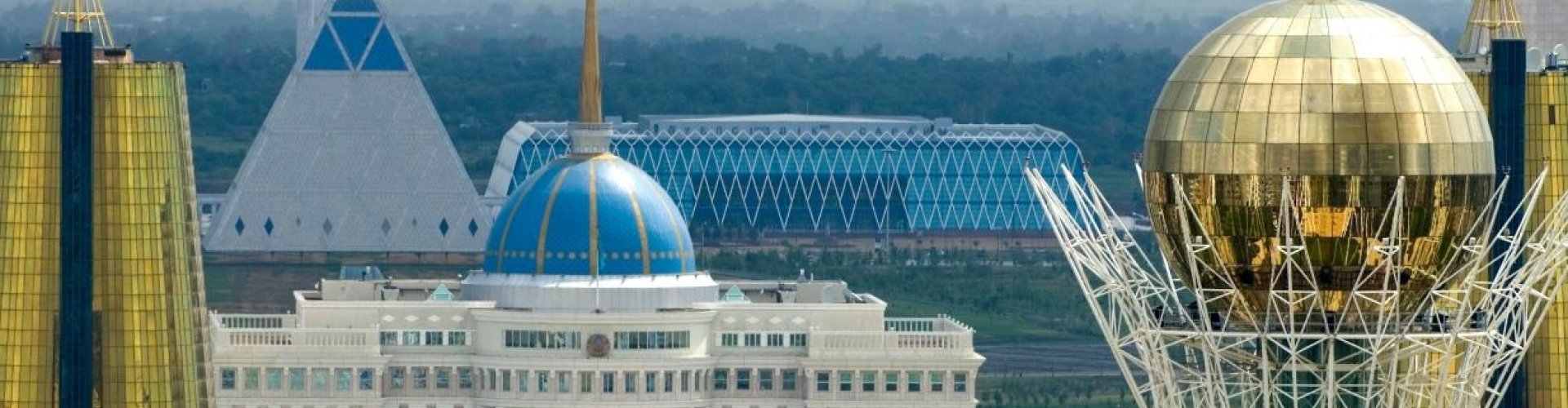 Night skyline of Astana with parked cars