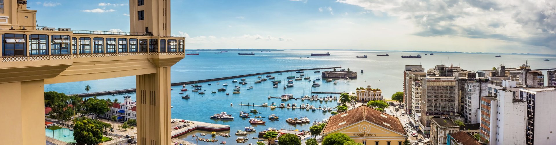 Salvador night skyline with parked cars