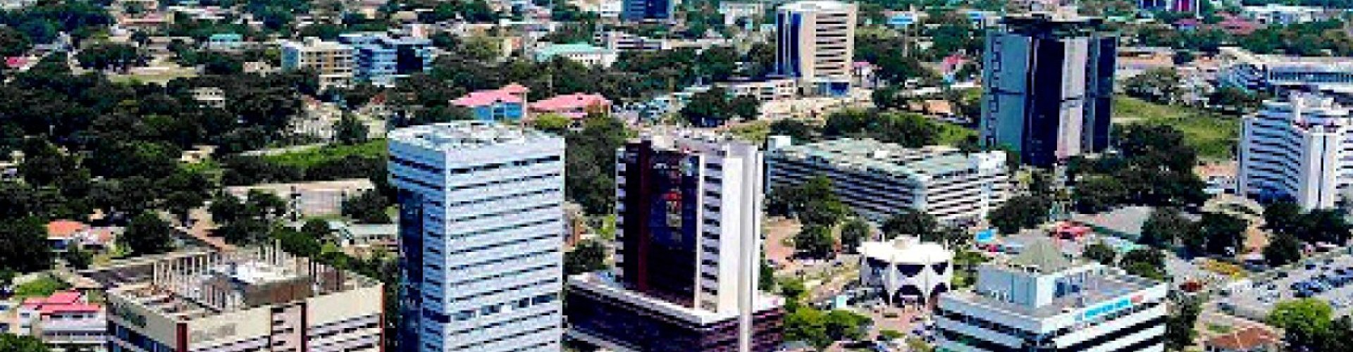 Accra night skyline with parked cars