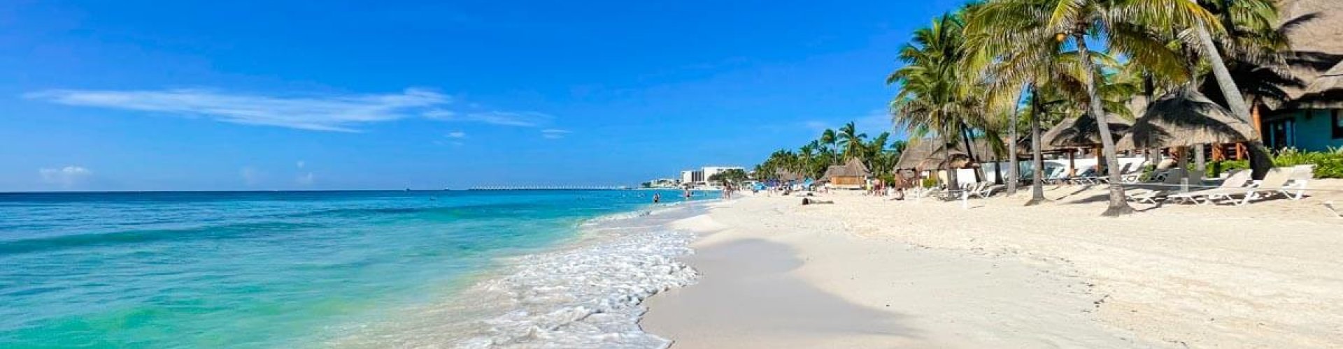 Playa del Carmen night skyline with parked cars