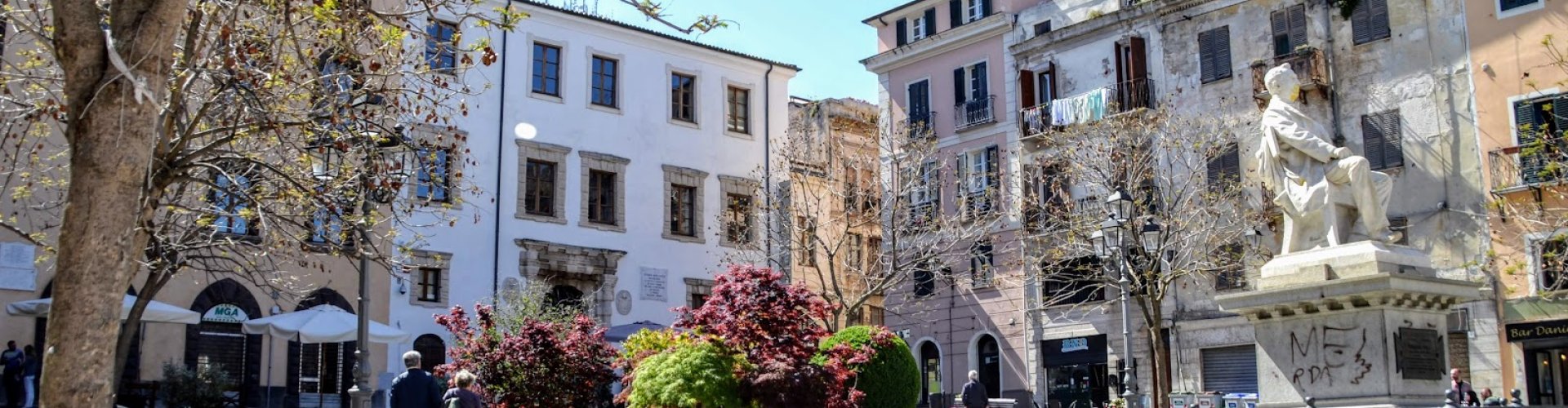 Sassari night skyline with parked cars