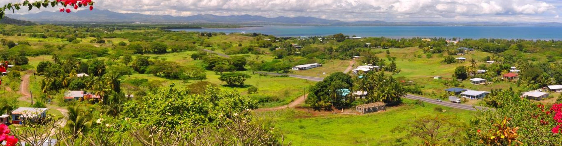 Nadi night skyline with parked cars