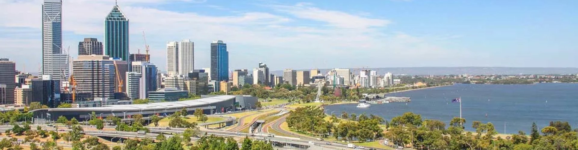 Perth night skyline with parked cars