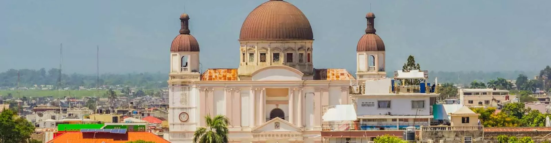 Night skyline with parked cars in Cap Haitien