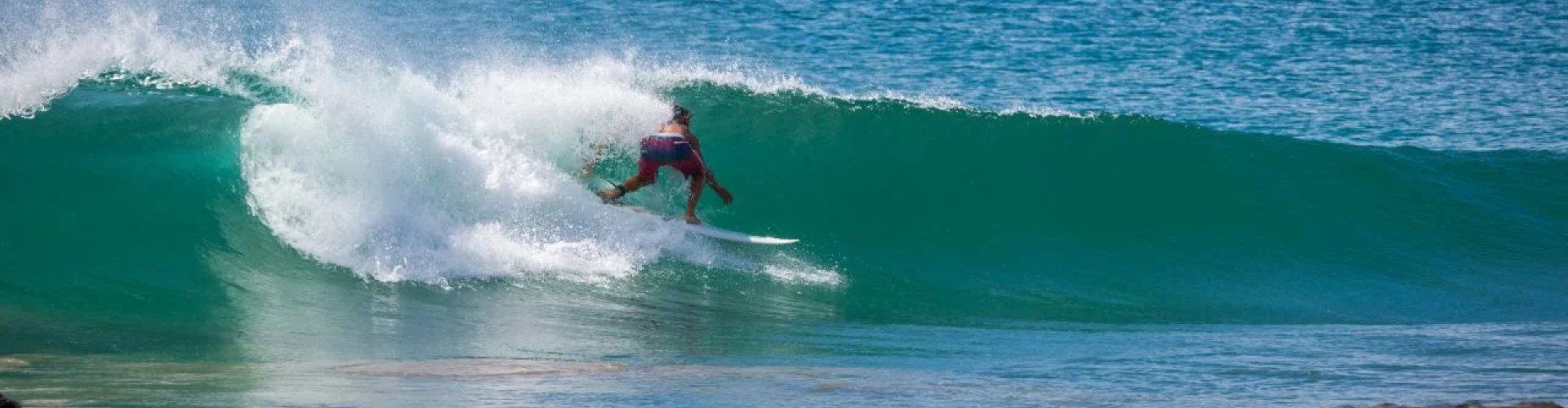 Chinandega night skyline with parked cars