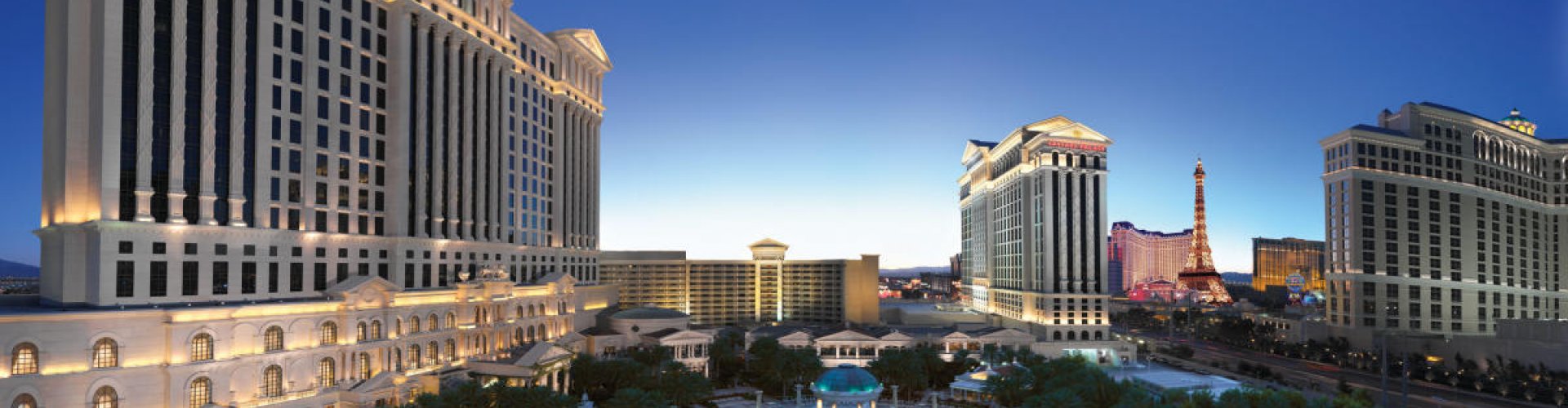 Las Vegas night skyline with parked cars