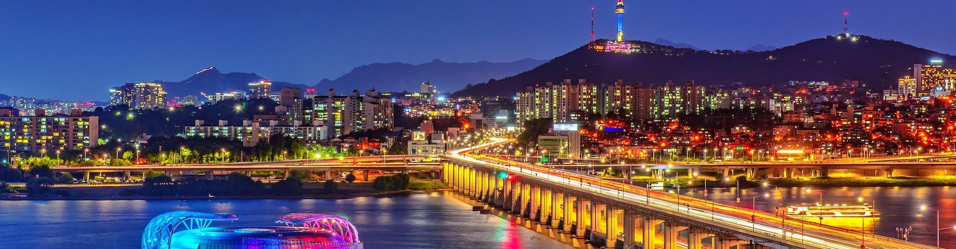 Seoul night skyline with parked cars