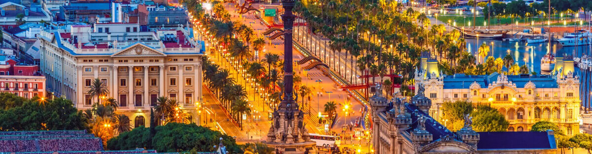 Barcelona night skyline with parked cars
