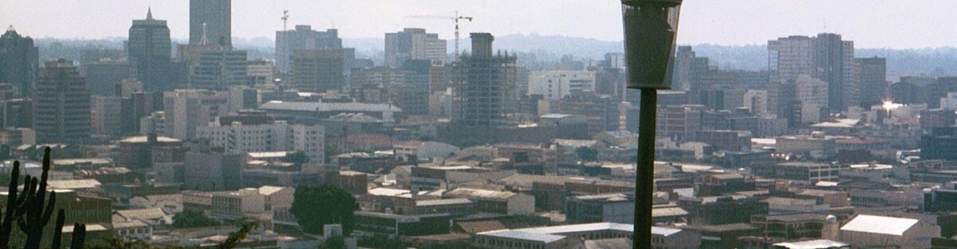 Harare night skyline with parked cars