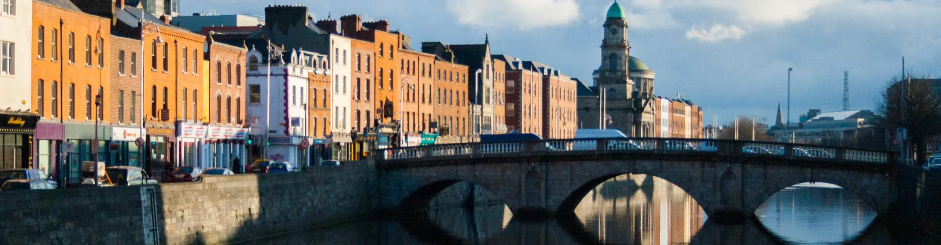 Dublin night skyline with parked cars