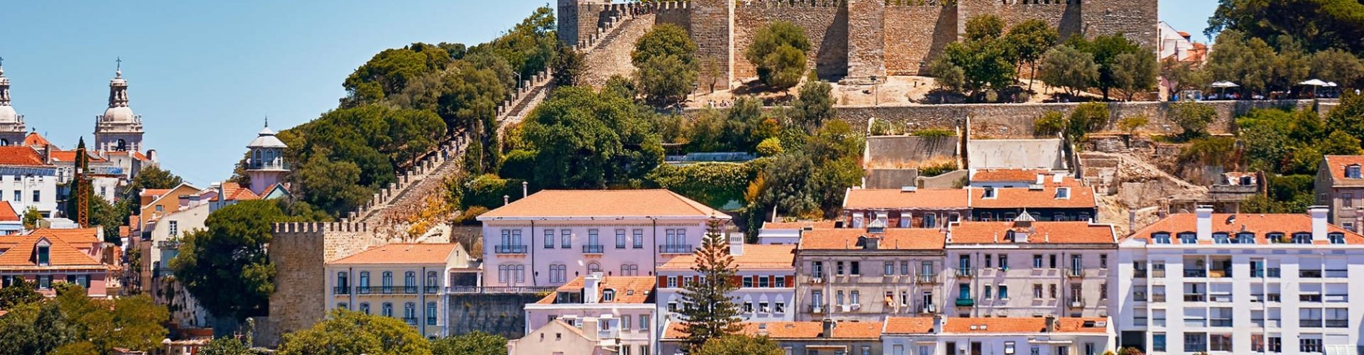Lisbon Night Skyline with Parked Cars