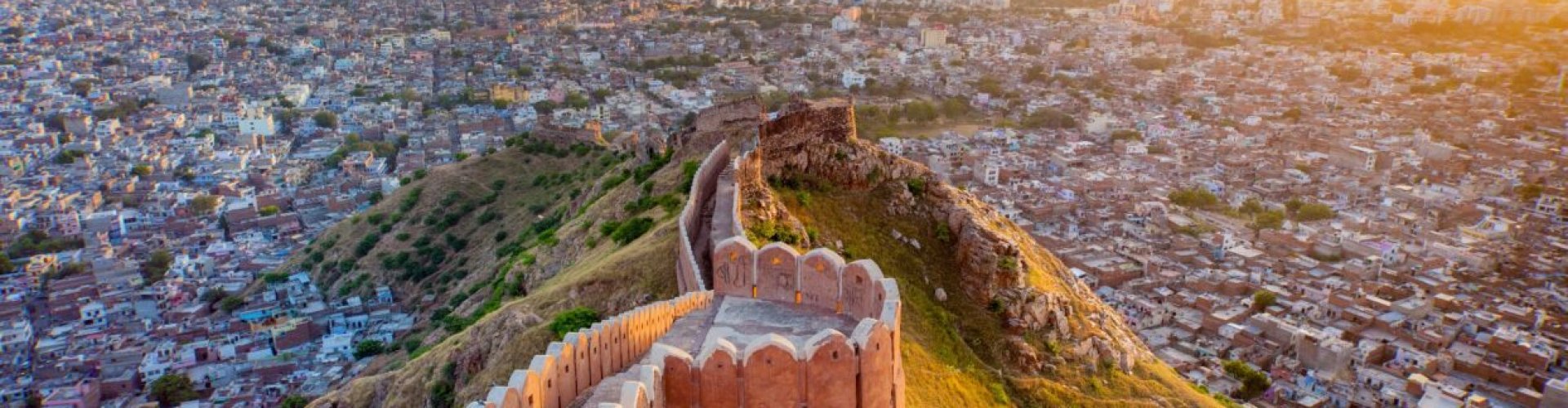 Jaipur night skyline with parked cars