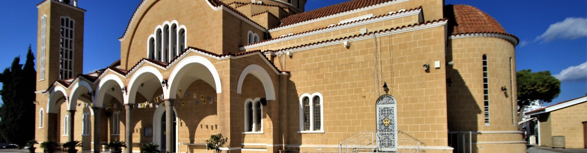 Paralimni night skyline with parked cars