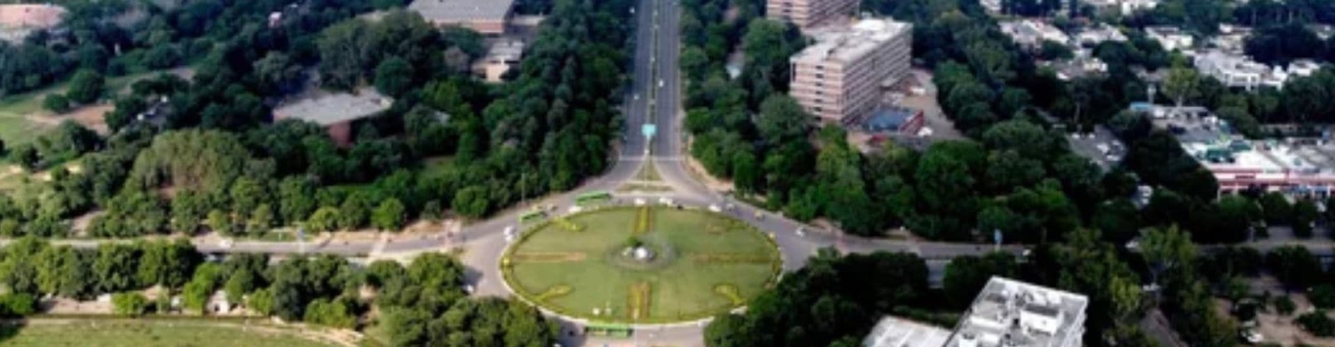 Chandīgarh night skyline with parked cars