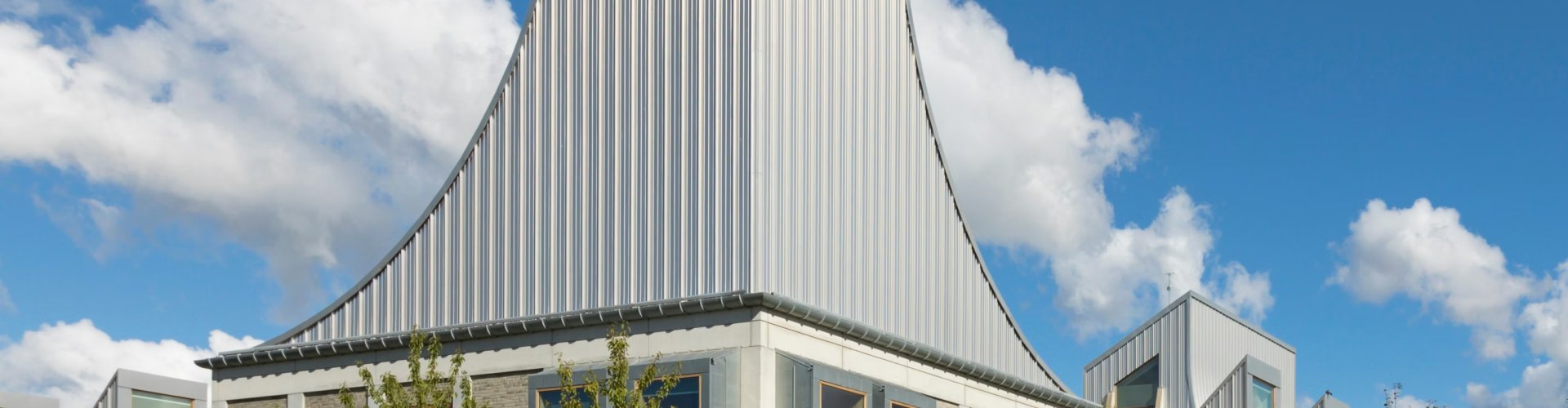 Aalborg night skyline with parked cars
