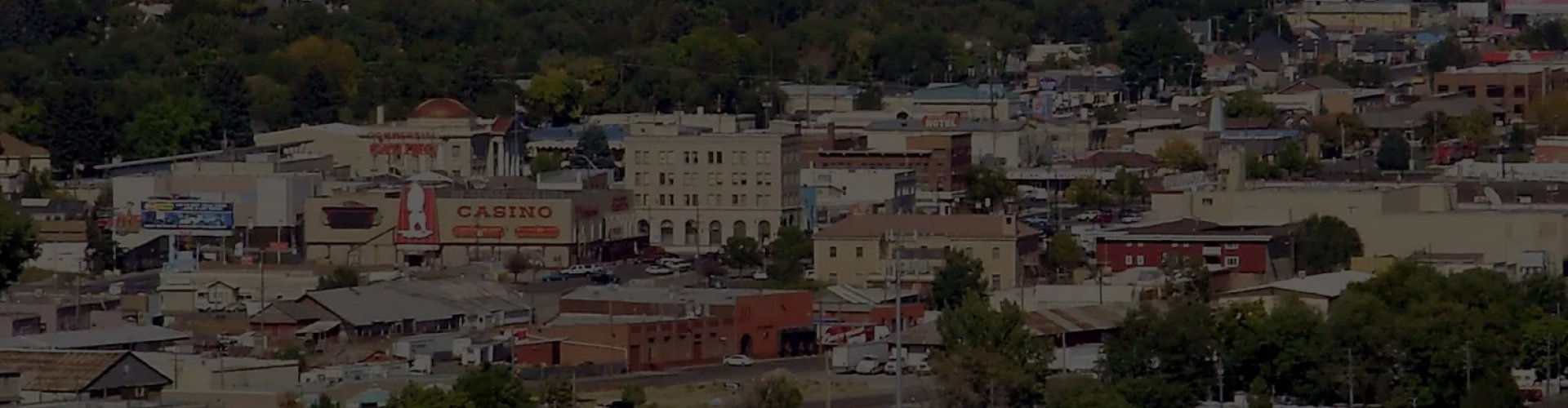 Elko, NV, US night skyline with parked cars