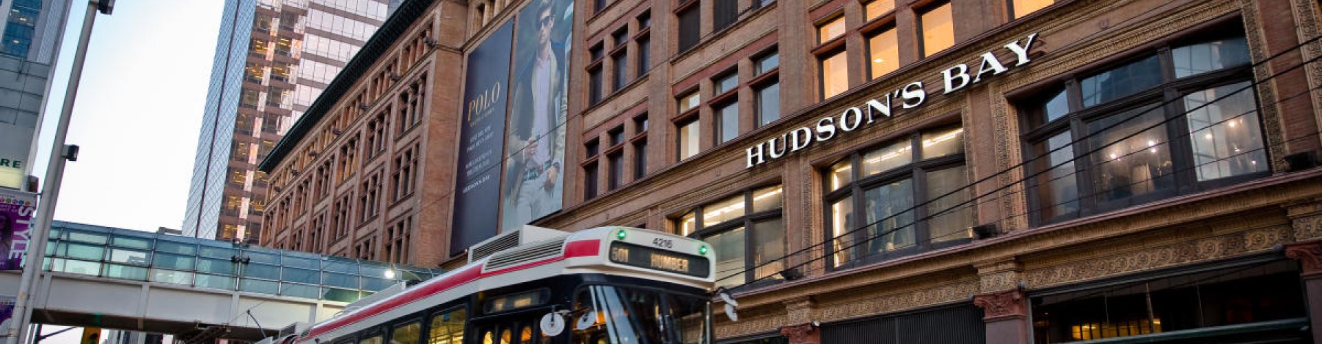 Toronto night skyline with parked cars