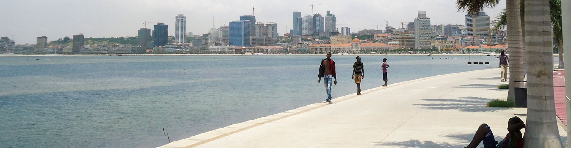 Luanda night skyline with parked cars