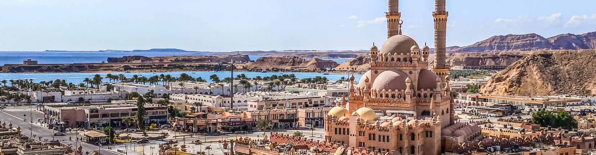 Sharm El Sheikh night skyline with parked cars