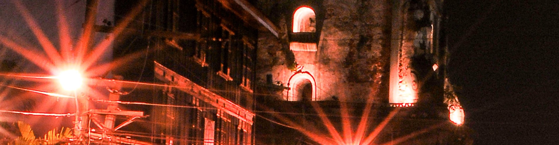 Night skyline with parked cars in Laoag