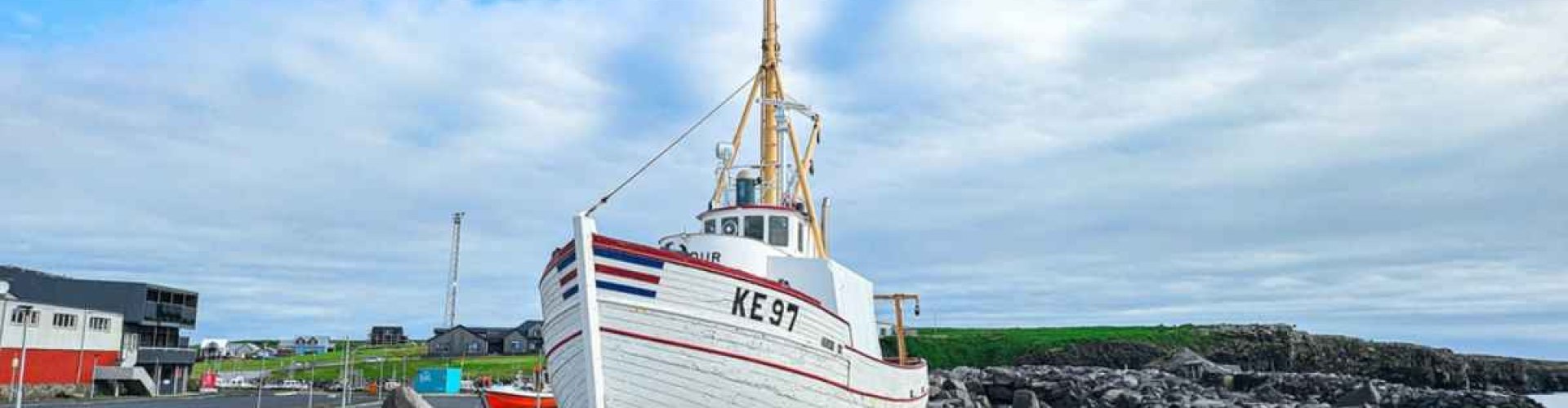 Keflavik Night Skyline with Parked Cars