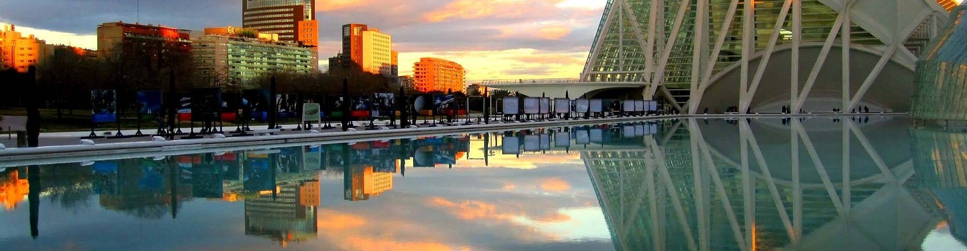 Valencia night skyline with parked cars