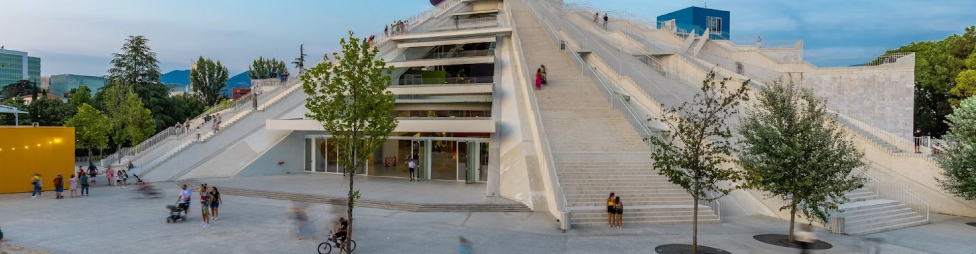 Tirana night skyline with parked cars