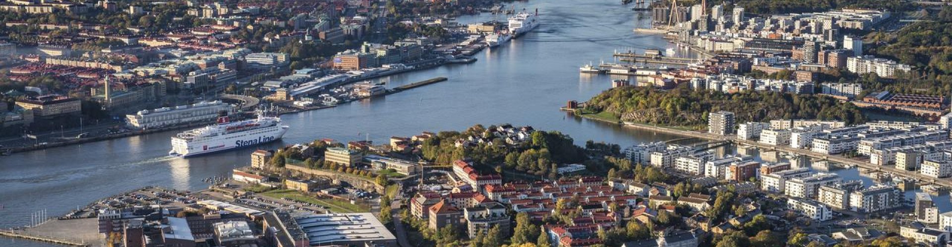 Gothenburg night skyline with parked cars