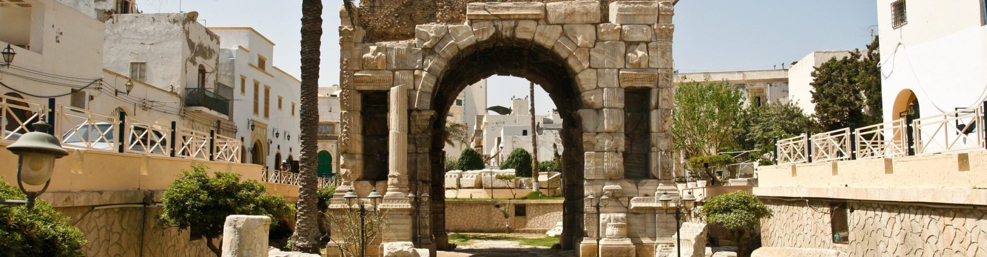 Tripoli night skyline with parked cars