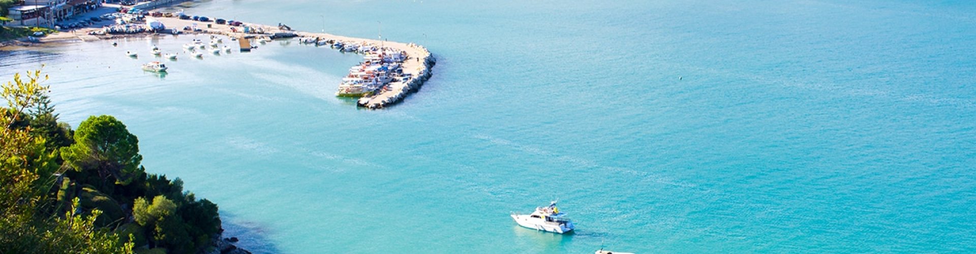 Night skyline with parked cars in Limni Keri, GR