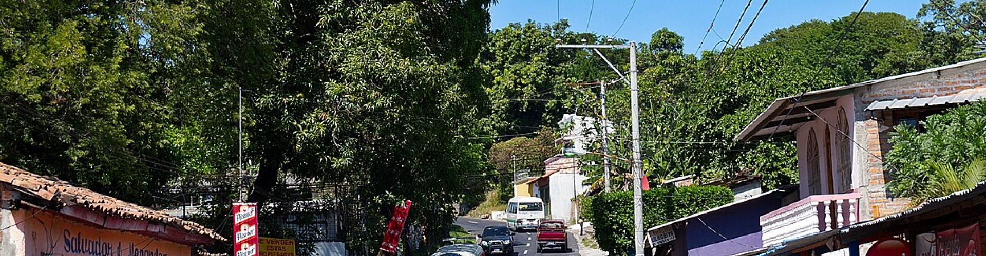 San Luis Talpa night skyline with parked cars