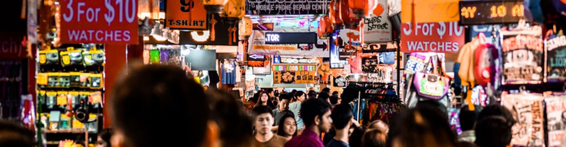 Singapore night skyline with parked cars