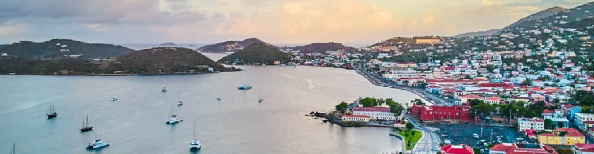 St Thomas night skyline with parked cars