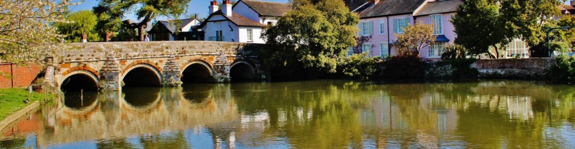 Christchurch night skyline with parked cars