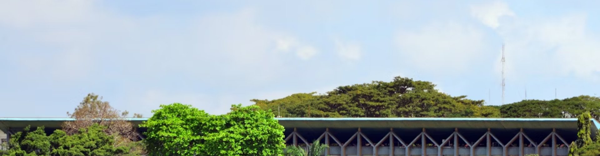 Abidjan night skyline with parked cars