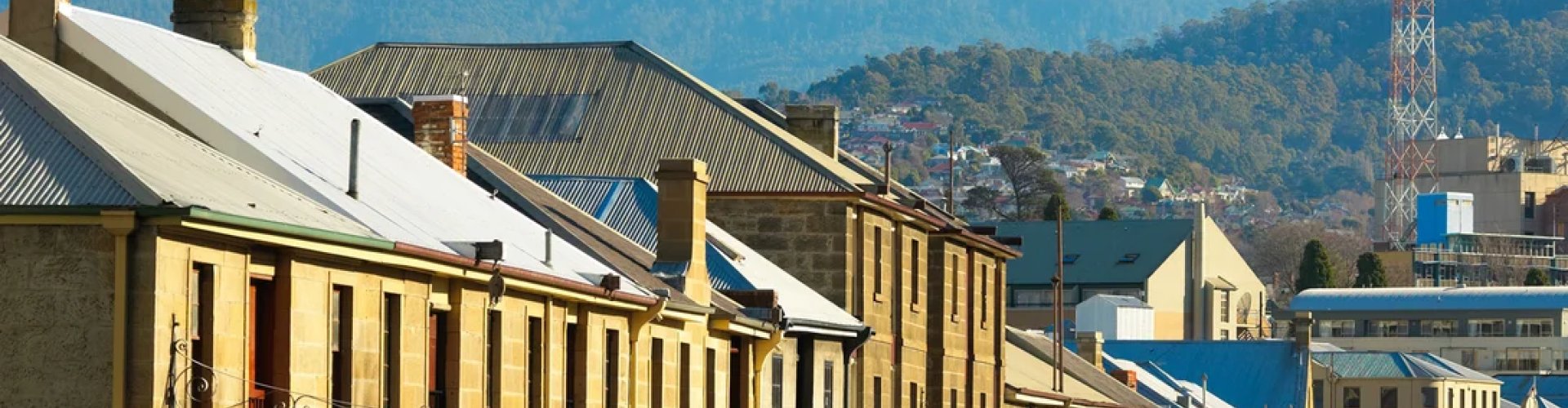 Hobart night skyline with parked cars
