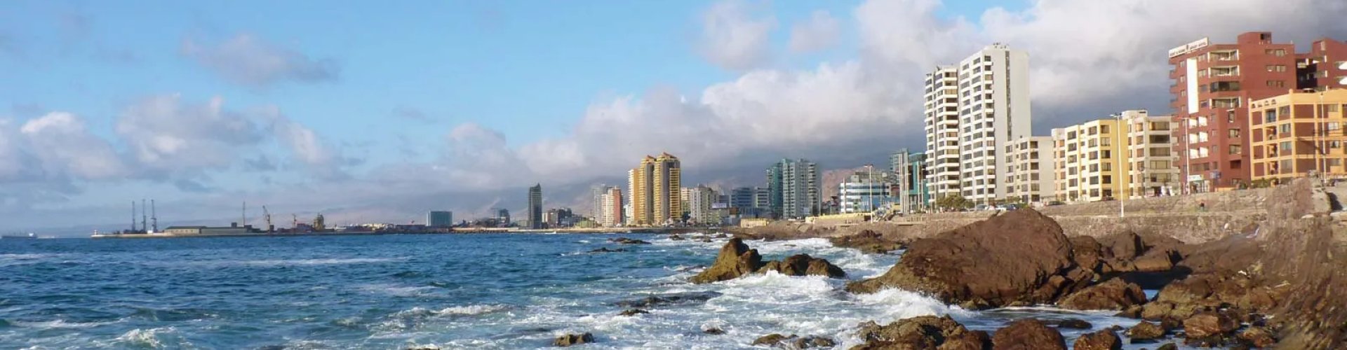Antofagasta night skyline with parked cars