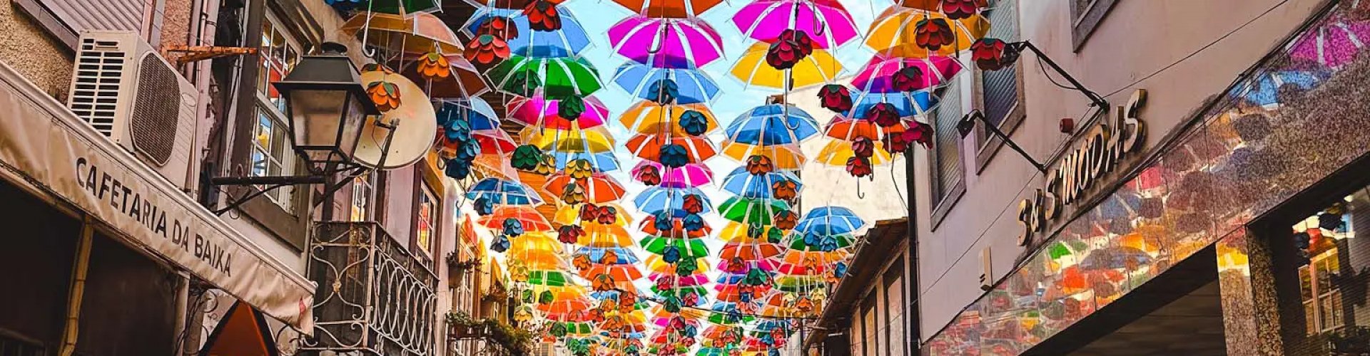Aveiro night skyline with parked cars