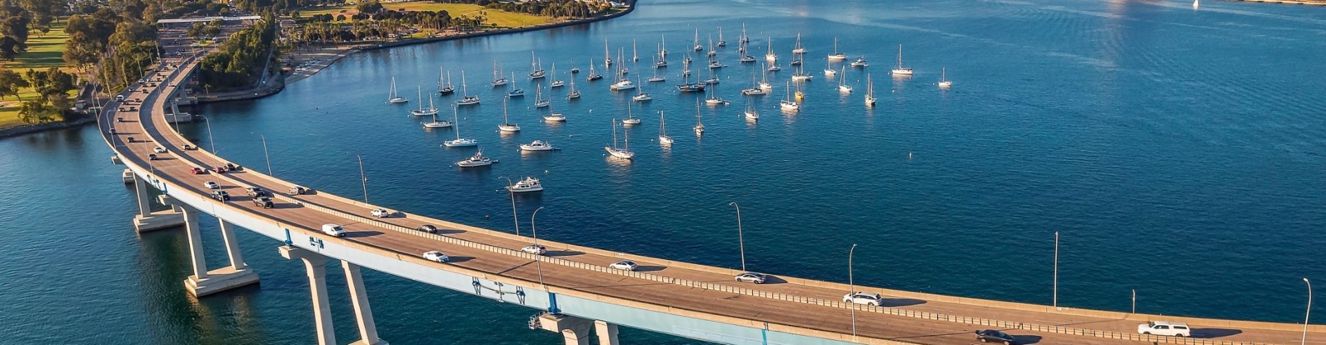 Coronado night skyline with parked cars